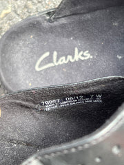 Woman’s Clarks Open-back Clog. 7W Black Leather